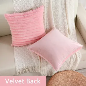 Pink faux rabbit fur and velvet throw pillow detail showcasing soft texture for sofa.