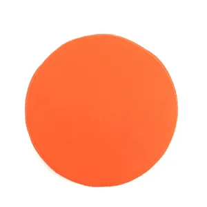 Orange round seat cushion detail, soft cotton canvas fabric for comfortable home chairs.