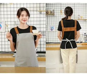 Nordic style canvas kitchen apron for women, minimalist work apron with cross back straps.