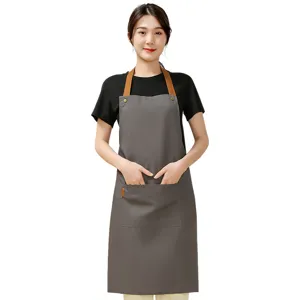 Nordic style canvas work apron for kitchen, restaurant and coffee shop with pockets and straps.