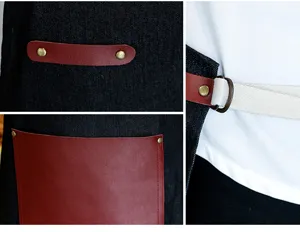 Gros plan des détails du tablier en jean avec poche en cuir, rivets et lanière réglable.