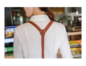 Détails des bretelles croisées réglables du tablier avec des rivets en métal solide.