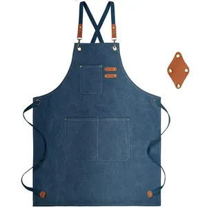 Thickened denim canvas apron with cross back straps and utility pockets for kitchen cooking work.