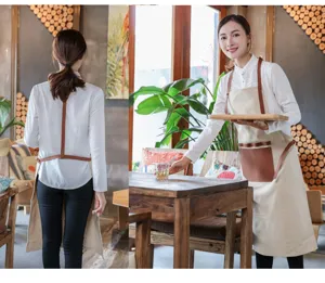 Tablier en toile de style coréen avec lanières en cuir PU et poches pour café cuisine.