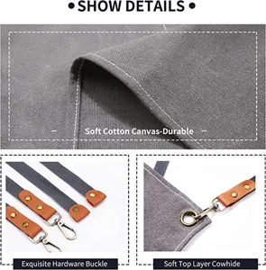 Detailed view of thick canvas work apron featuring durable hardware and genuine cowhide.