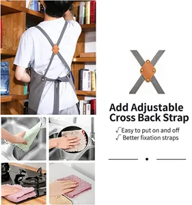 Detail view of the thickened canvas apron featuring adjustable cross-back straps for easy wear.