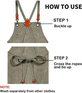 Heavy duty canvas work apron with cross back straps and durable leather details.