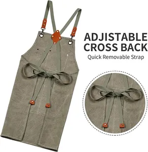 Adjustable cross back canvas work apron with quick removable strap for kitchen and gardening.
