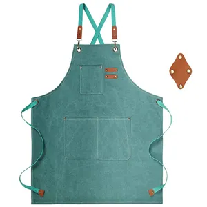 Thick canvas work apron with cross back straps and pockets for kitchen gardening.