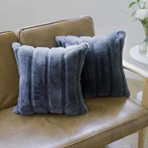 Soft faux rabbit fur plush throw pillow with vertical stripes detail for cozy home decor.
