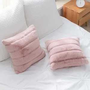 Soft pink faux fur pillowcase set, cozy ribbed plush cushion cover for bedroom sofa decor.