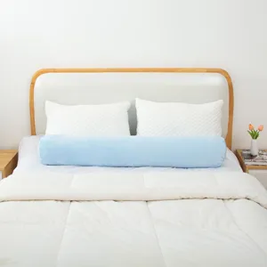 Comfortable long cylindrical blue body pillow for bedroom sleeping and side sleeping.