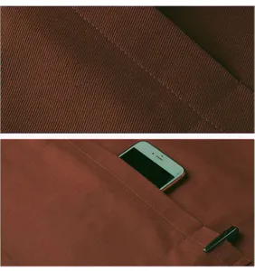 Vista dettagliata della texture del tessuto del grembiule da cucina e tasca di lavoro.