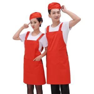 Rotes Schürzen- und Kochmützen-Set für Küchen-, Restaurant- und Café-Personal Hauptansicht.