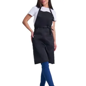 Black kitchen apron with pockets for cooking, baking, and serving tasks. Durable fabric.