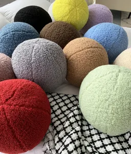 Round sherpa plush ball pillow, cozy teddy fleece decorative cushion for sofa bed decor.