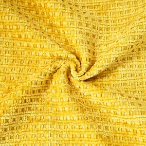 Yellow chenille fabric texture detail close up for pillow cover and sofa cushion upholstery design