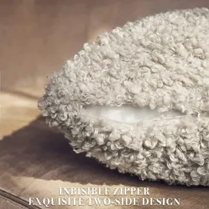 Close-up detail of the fuzzy boucle pillow cover showing exquisite zipper and soft texture.