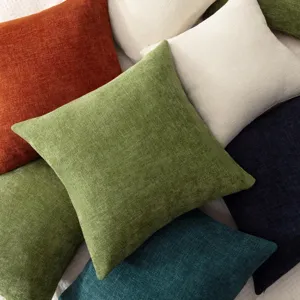 Detailed shot of textured chenille throw pillow fabric showing vibrant multi-color design.