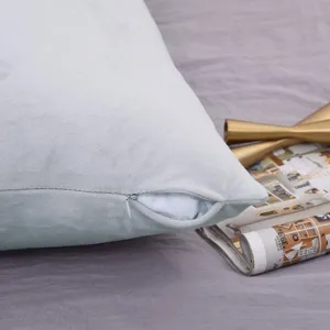 Close-up detail of soft velvet body pillowcase featuring neat zipper opening on cozy bed.