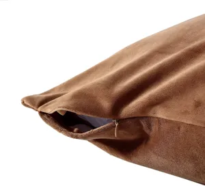 Close-up detail of brown velvet body pillowcase zipper opening, showing soft fabric texture.
