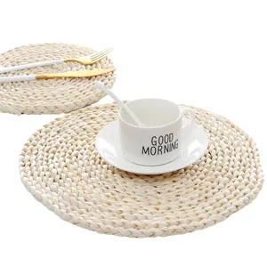 Round braided corn husk placemat natural straw woven heat resistant mat for table decor main