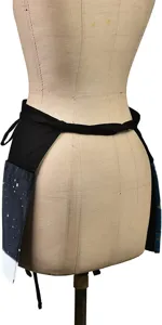 Polyester half waist apron with multi pockets and galaxy print design for kitchen or work use.