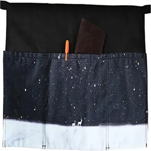 Close-up detail of half waist apron with starry night deer print, multiple utility pockets.