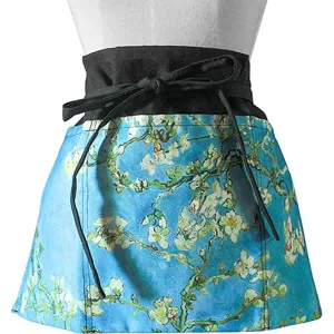 Blue almond blossom print half waist apron with black wide waistband, professional apron main view