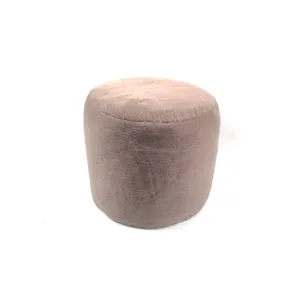 Nordic minimalist round plush ottoman, soft short fleece footstool for living room detail.