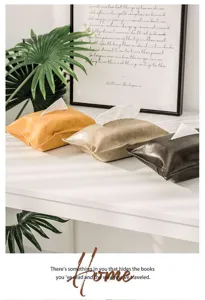 Detailed view of luxury oil wax leather tissue box covers in stylish colors, home decor.
