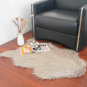 Fluffy faux sheepskin area rug, soft plush floor carpet for bedroom and living room decor.