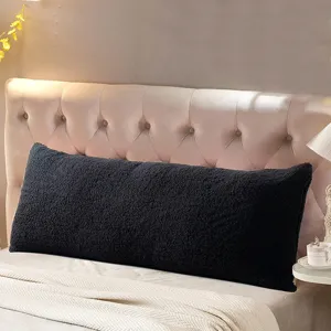 Coussin de corps en peluche noire pour tête de lit, long traversin de soutien confortable.