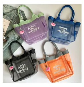 Transparent mesh tote bag for women, large capacity waterproof casual handbag with handle.