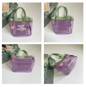 Transparent purple mesh tote bag with green handles, casual waterproof shoulder bag for women.
