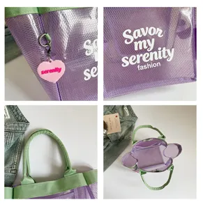 Detailed view of transparent mesh tote bag featuring purple body, green handles and text print.