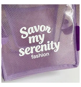 Purple mesh handbag detail, stylish waterproof cosmetic tote bag for women daily use.