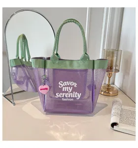 Transparent mesh tote bag with green handles and purple body, stylish casual large capacity handbag.