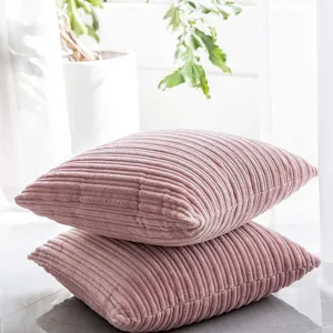 Pink corduroy throw pillow detail shot, soft cushion cover for sofa bed and office