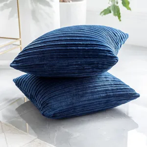 Dark blue corduroy throw pillow detail, soft textured square cushion for sofa and bed.