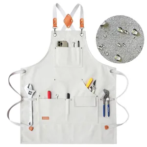 Canvas work apron detail, waterproof fabric texture and multiple tool pockets for chef.