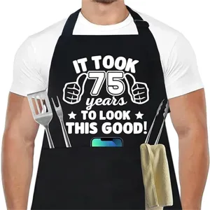 Delantal de cocina negro de algodón con texto divertido de 75 cumpleaños y bolsillos.