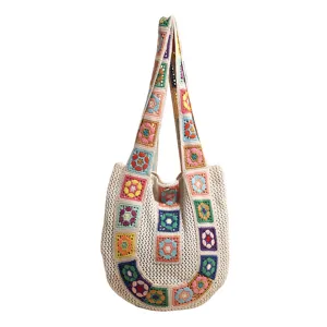 Knitted crochet tote bag for women, stylish beach shoulder bag with colorful floral design.