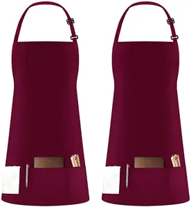 Grembiule da cucina bordeaux in poliestere con tracolla regolabile e tasche anteriori.