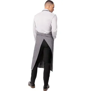 Professional back view detail of a gray cross-back work apron for kitchen and restaurant staff.