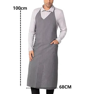 Grey kitchen work apron with pockets, adjustable neck strap for chef, restaurant.
