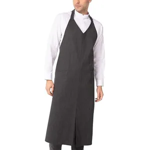 Detailed close-up view of the dark grey V-neck long work apron for restaurant kitchen.