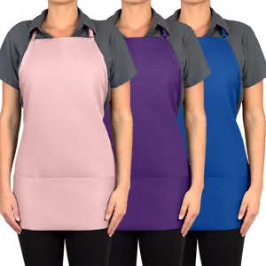 Adjustable kitchen apron with three pockets, durable workwear for cooking and restaurant use.