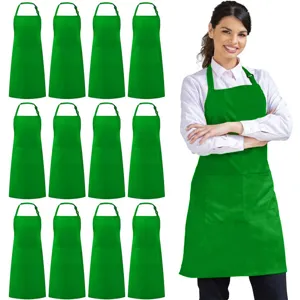 Pack of 12 green polyester aprons with pockets and adjustable neck straps for kitchen cooking.