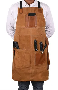 Multi-pocket leather BBQ apron for kitchen cooking, baking, and workshop utility use.